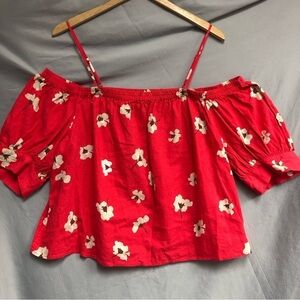 Universal thread, large, pinkish, red top with white flowers off the shoulder